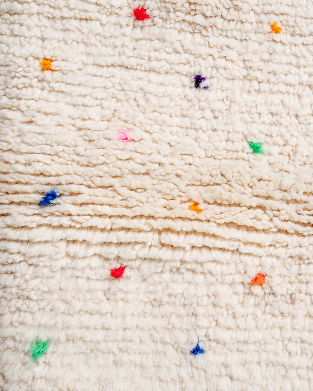 Modern, designer, handcrafted Berber rug from Morocco. Beniourain carpet with beautiful colours and patterns and fluffy wool texture.